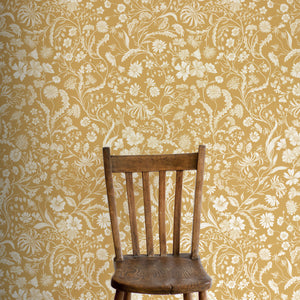 The Lost Garden Wallpaper in Honeysuckle wallpaper by Studio Le Cocq in yellow in a styled room setting