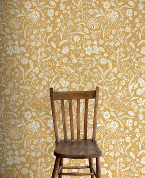 The Lost Garden Wallpaper in Honeysuckle wallpaper by Studio Le Cocq in yellow in a styled room setting