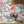The Mediterranean wallpaper by Brand McKenzie in aqua, a whitewashed hillside village in a dining room