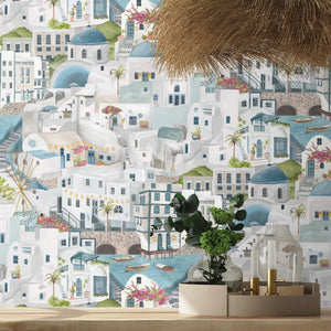The Mediterranean wallpaper by Brand McKenzie in grey and blue, a whitewashed hillside village in a dining room