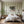 The Circus Big Top wallpaper by Annika Reed in green, big top stripes in a bedroom