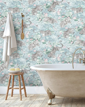 Tiger Lily wallpaper by Brand McKenzie in pale blue, tigers among lilies in a bathroom setting