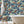 Tiger Lily wallpaper by Brand McKenzie in navy, tigers among lilies in a bathroom setting