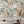 Travel Map wallpaper by Brand McKenzie in terracotta and khaki, close-up of an illustrated travel map