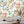 Travel Map wallpaper by Brand McKenzie in brown, an illustrated travel map in a home office