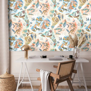 Travel Map wallpaper by Brand McKenzie in peach, an illustrated travel map above a work desk