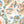 Travel Map wallpaper by Brand McKenzie in peach, close view of an illustrated travel map