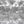 Tropical Reflections wallpaper by Brand McKenzie in black and white, close-up of palms reflected in water