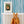 Beside the Seaside wallpaper by Annika Reed in teal, seaside stripes above a sideboard