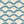Wiggly Squiggly wallpaper by Annika Reed in teal and yellow, full repeat of wiggly waves