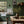 Wiggly Squiggly wallpaper by Annika Reed in green, wiggly waves in a kitchen