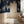 Wisteria Rainfalls wallpaper by Dami and Em Design in blue, falling wisteria in an entryway