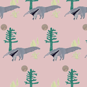 The Anteater wallpaper by Annika Reed in pink, full repeat of anteaters and trees