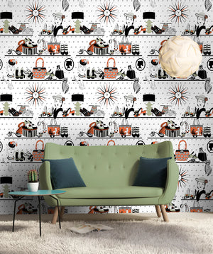 Accessorize wallpaper by Dupenny in multicolour, shelves of accessories behind a sofa in a living room