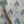 Agra linen by Annika Reed in blue, flat sample of block-print flowers in a trellis