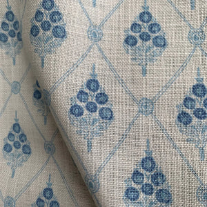 Agra linen by Annika Reed in blue, flat sample of block-print flowers in a trellis