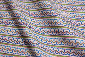 Aperitivo linen by Bethie Tricks in blue and purple, draped, showing fine block-print stripes