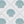Aphrodite wallpaper by Annika Reed in blue, partly unrolled roll showing scallop shells