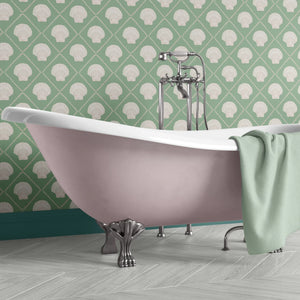 Aphrodite wallpaper by Annika Reed in green, scallop shells on a bathroom wall
