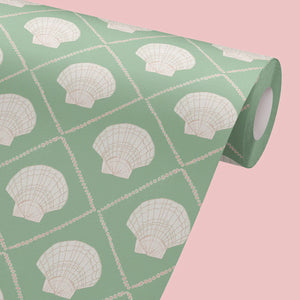 Aphrodite wallpaper by Annika Reed in green, sample roll showing scallop shells