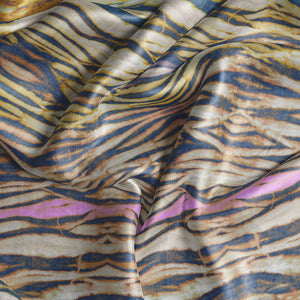 Arashi velvet by Tatie Lou in rust and pink, draped, showing arashi shibori stripes