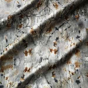 Ashed Marble velvet by Dami and Em Design in grey, draped, showing a marbled design