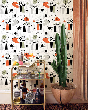 Atomic wallpaper by Dupenny in multicolour, atomic-age motifs on a feature wall