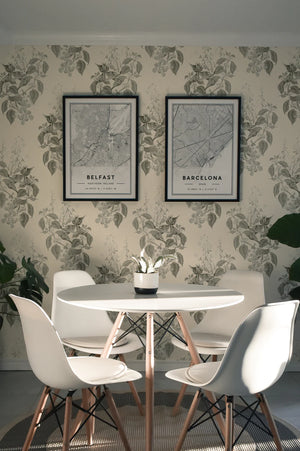 Aviary Isle wallpaper by Deus ex Gardenia in grey, birds among island flowers behind a dining table