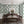 Aviary Isle wallpaper by Deus ex Gardenia in green, birds among island flowers in a dining area