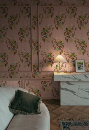 Aviary Isle wallpaper by Deus ex Gardenia in pink, birds among island flowers in a living room