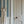 Balancing Act wallpaper by Annika Reed in blue, hand-painted stripes in an entryway