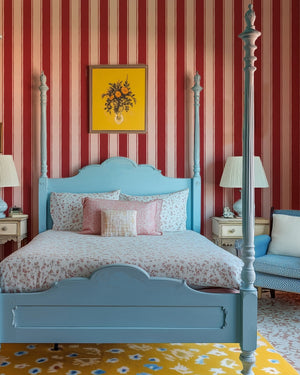 Balancing Act wallpaper by Annika Reed in red, hand-painted stripes in a bedroom
