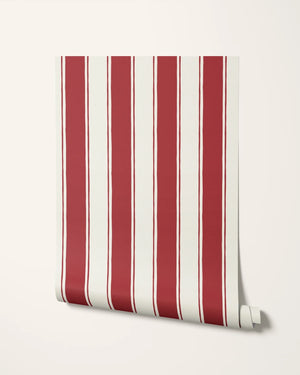 Balancing Act wallpaper by Annika Reed in red, sample roll showing hand-painted stripes