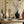 Balancing Act wallpaper by Annika Reed in cream, hand-painted stripes behind a console table
