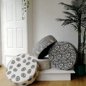 Opium linen by Bethie Tricks in black and white, bold wheel motifs made into a lampshade