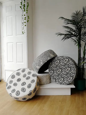 Opium linen by Bethie Tricks in black and white, bold wheel motifs made into a lampshade