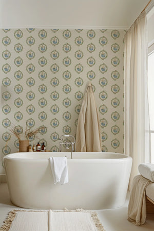 Mermaids in Seashore wallpaper by Annika Reed in cream and green, mermaids in wreaths on a bathroom wall