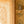 Mermaids in Seashore wallpaper by Annika Reed in gold, close-up of mermaids in wreaths
