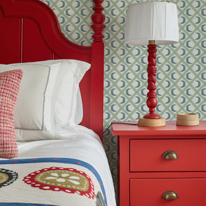 Kit Moon wallpaper by Annika Reed in blue and green, crescent moons in a lattice in a bedroom