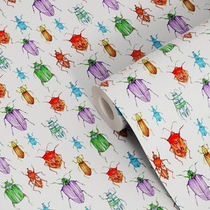 Beetle wallpaper by Seed Home Designs in red, blue and green, roll showing watercolour beetles