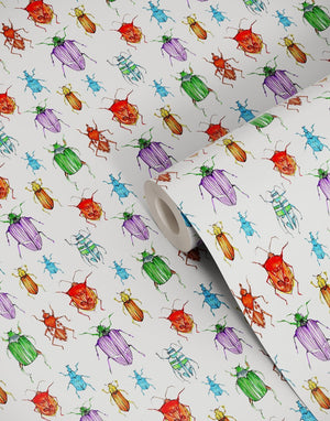 Beetle wallpaper by Seed Home Designs in red, blue and green, roll showing watercolour beetles