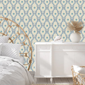Belle wallpaper by Tatie Lou in blue, an ornate ogee trellis in a bathroom