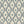 Belle wallpaper by Tatie Lou in black and white, full repeat of an ornate ogee trellis