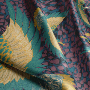 Pachamama velvet by Tatie Lou in purple, in soft folds showing flying cranes