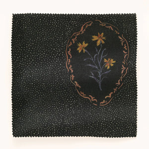 Bibury Sprig linen by Parker and Jules in black, full repeat of embroidered flowers in ovals
