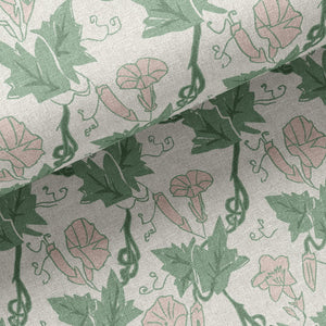 Bindweed Pink Trumpet linen by Annika Reed in green and pink, in soft folds showing trailing bindweed flowers
