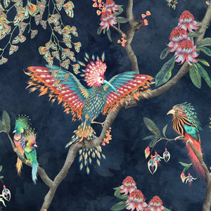 Birds in Paradise wallpaper by Brand McKenzie in navy, detail of tropical birds on blossoming branches