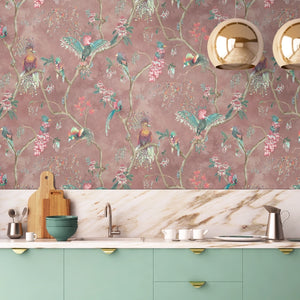 Birds in Paradise wallpaper by Brand McKenzie in pink, tropical birds on blossoming branches above a cabinet