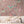 Birds in Paradise wallpaper by Brand McKenzie in pink, tropical birds on blossoming branches behind a console table