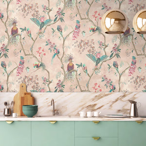 Birds in Paradise wallpaper by Brand McKenzie in pink behind a console table (alternate view)